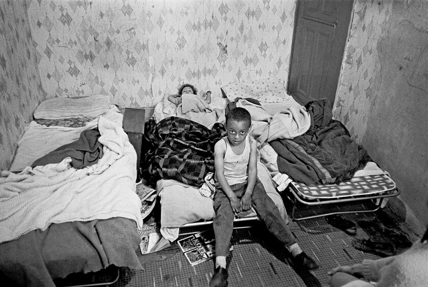 11 Child in his overcrowded bedroom 1971